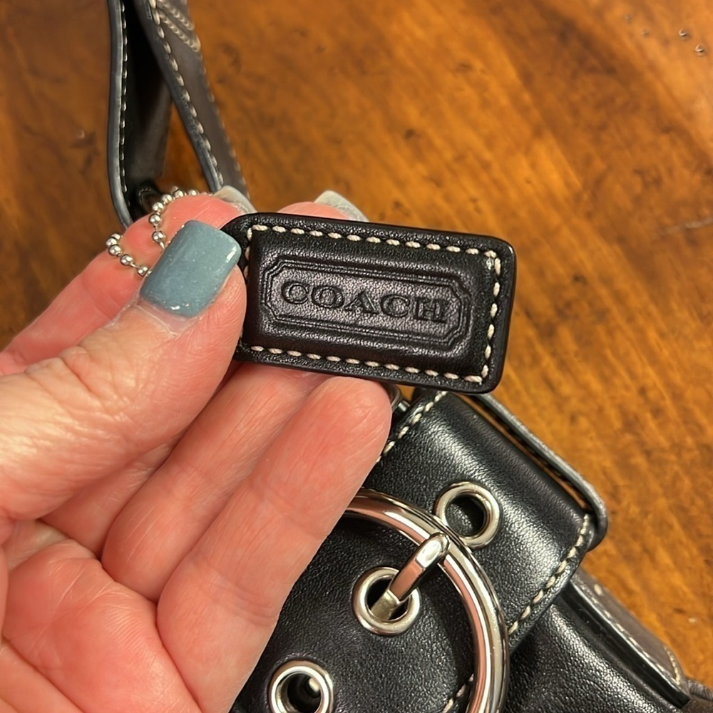 Coach handbag. Black all leather Coach purse with two silver buckles. - Picture 4 of 9